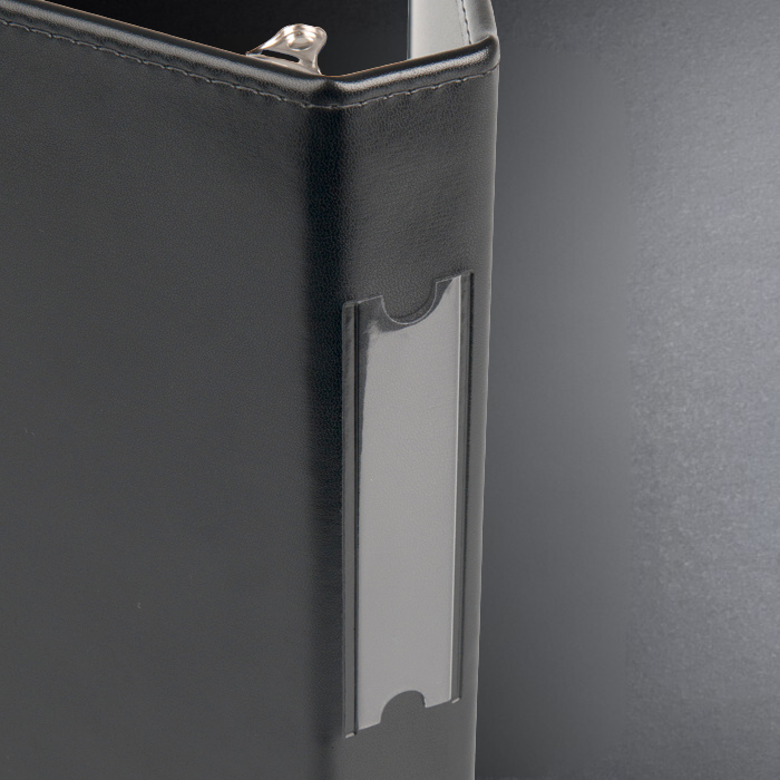 Black leather wallet with a card holder on a gray background