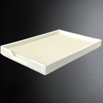 White rectangular tray on a dark gray background