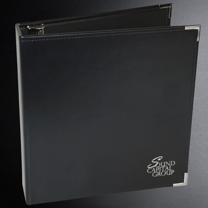 Black binder with 'Sound Capital Group' logo on a gray background