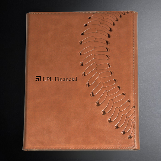 Brown leather-bound notebook with LPL Financial logo on a gray background