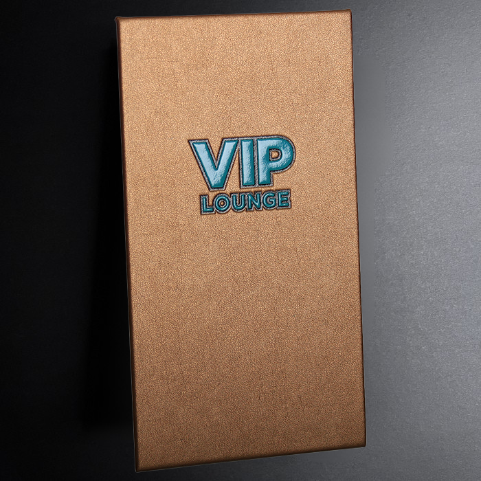 Brown leather-bound book with 'VIP Lounge' embossed on a dark background