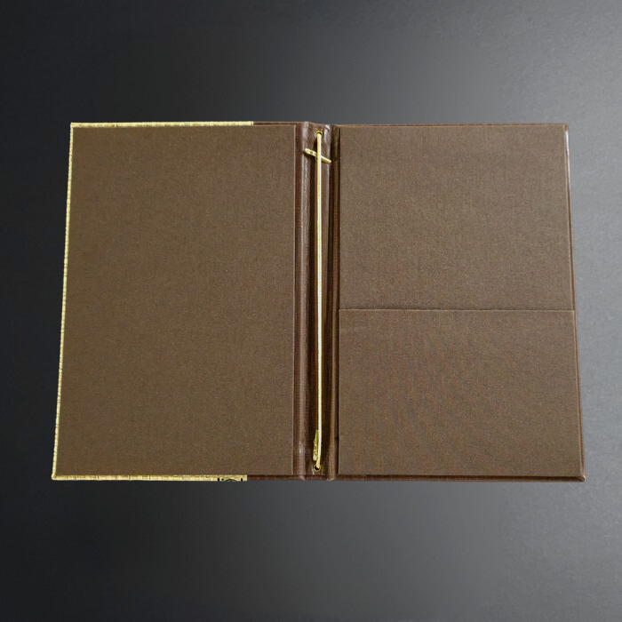 A brown textured binder or folder with a gold-tone metal ring closure, shown open against a dark gray gradient background.