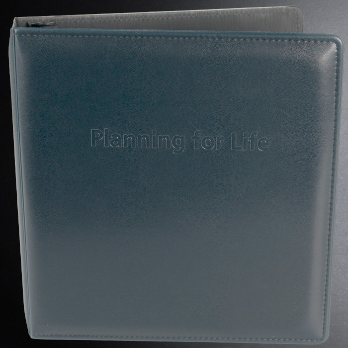 Blue planner with 'Planning for Life' text on a black background