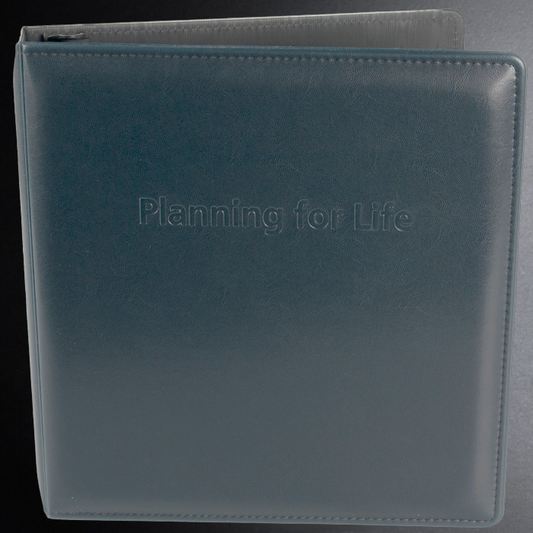Blue planner with 'Planning for Life' text on a black background