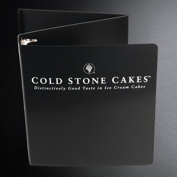 Black menu cover with 'Cold Stone Cakes' logo and text on a dark background