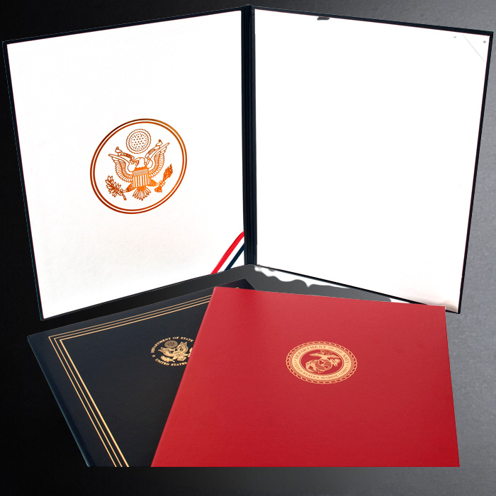 Graduation certificate holder with a red and black design on a gray background