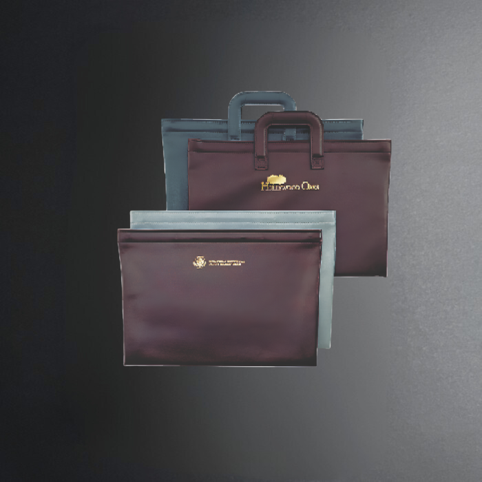 Two bags, one purple and one blue, with a visible brand logo on a dark background.
