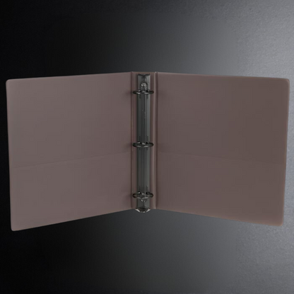 Pink binder with a metal ring on a dark gray background