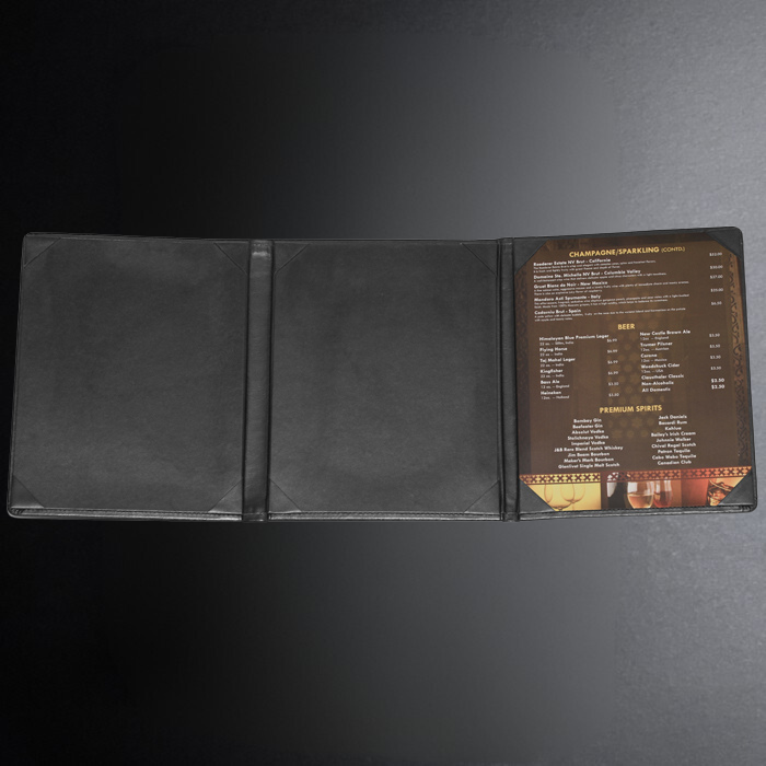 Open menu with drink list on a dark background