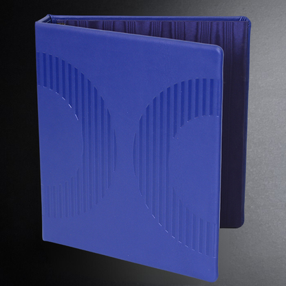Blue textured book on a dark background