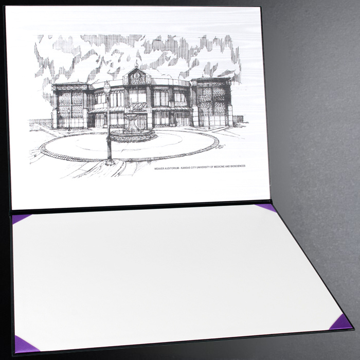 Architectural drawing of a building on a white card with a purple border, placed on a gray surface.