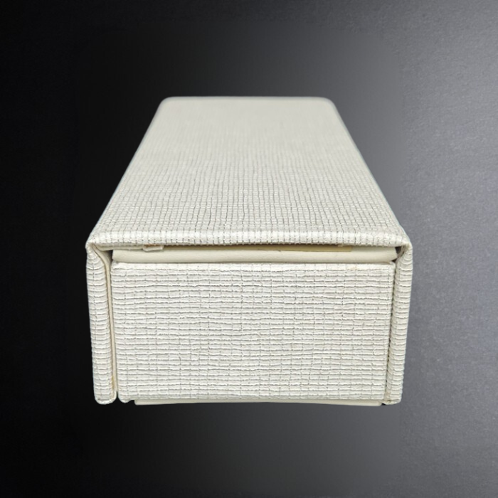 Rectangular box with textured surface on a gradient background