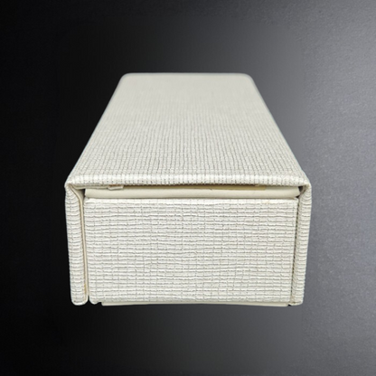 Rectangular box with textured surface on a gradient background