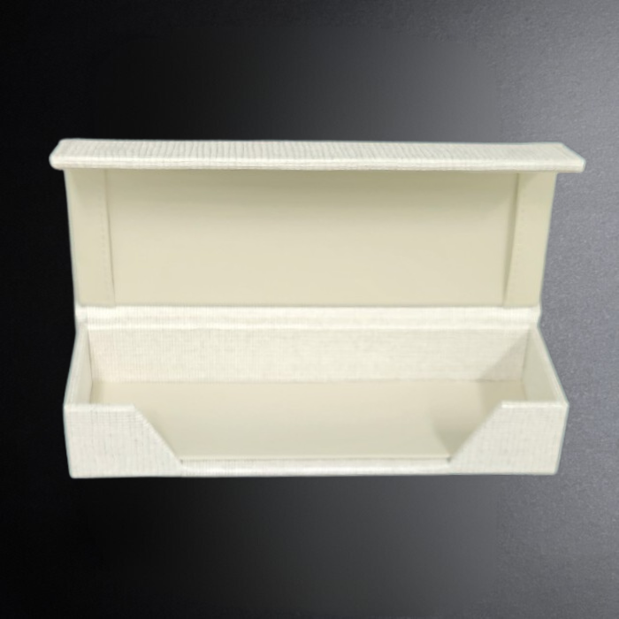White shoe rack with two shelves on a dark background