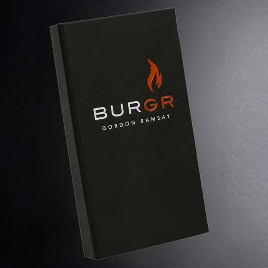 Black book titled 'BURGR Gordon Ramsay' on a dark background