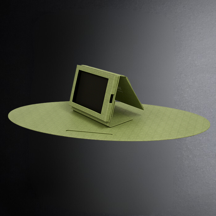 Green tablet stand on a dark gray background