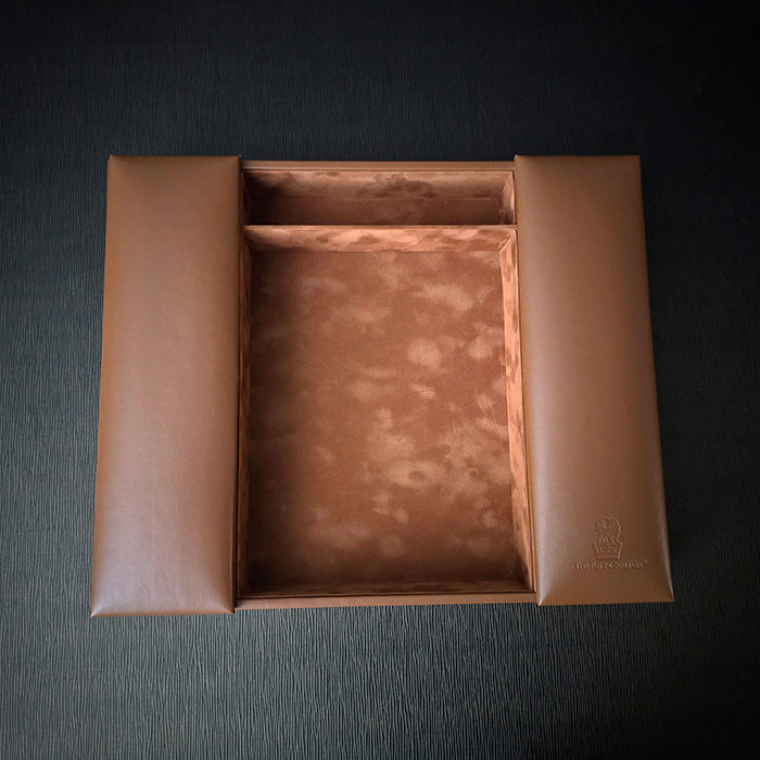 A square-shaped conference box with a tan urethane cover and felt divider walls, featuring a blind deboss logo on the top right corner.