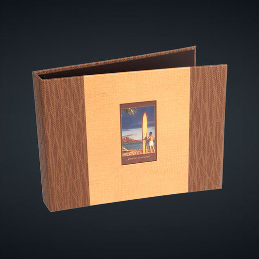 A directory binder with a surfer theme, featuring a wall-covering vinyl cover with a die cut window for a printed/laminated tip-in.