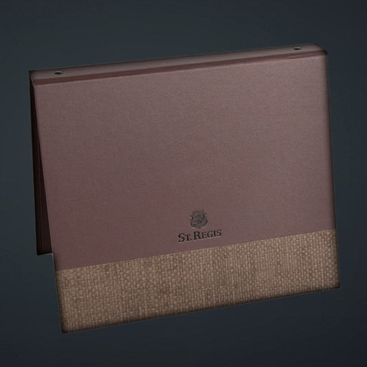 A brown St. Regis directory binder with French roast linen cover and matching basketweave design.