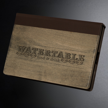 Menu cover with 'WATERTABLE food & drink' branding on a dark background