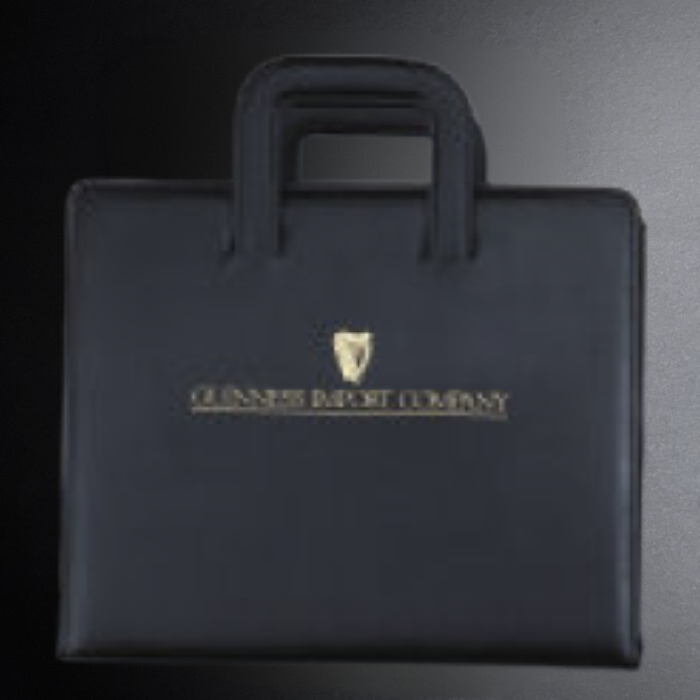 Black briefcase with a logo and text on a dark background