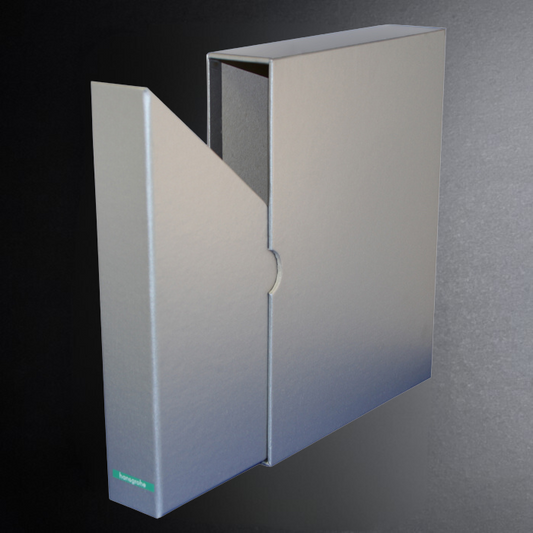 Metallic silver box with a brand logo on a gradient background