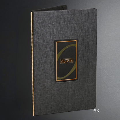 Gray textured menu cover with a logo on a gray background